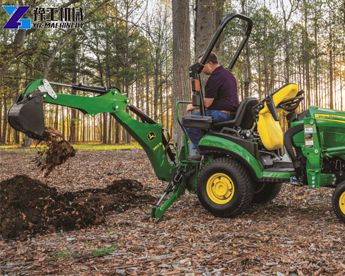 small tractor with loader and backhoe