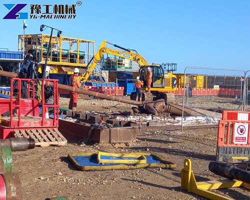 Horizontal directional drill rig working on underground pipeline installation site