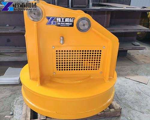 close up of excavator hydraulic magnet attachment