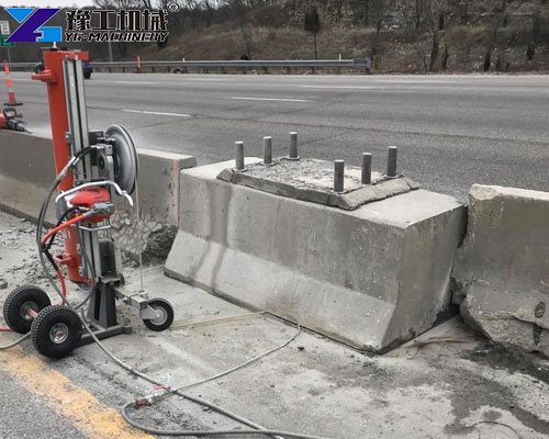 industrial concrete rope saw cutting vertical wall