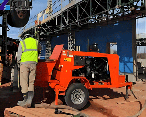 concrete pump delivering concrete to high rise building floors