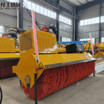 snow sweeper roller mounted on loader