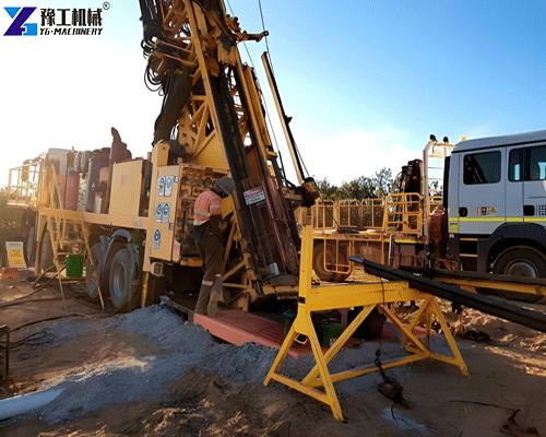 gold exploration team using RC drilling rig for mineral sampling