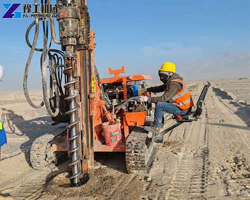 solar farm pile driver operating in Saudi Arabian desert terrain