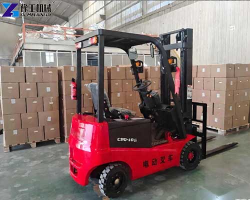 Compact electric forklift handling pallets in an Australian warehouse