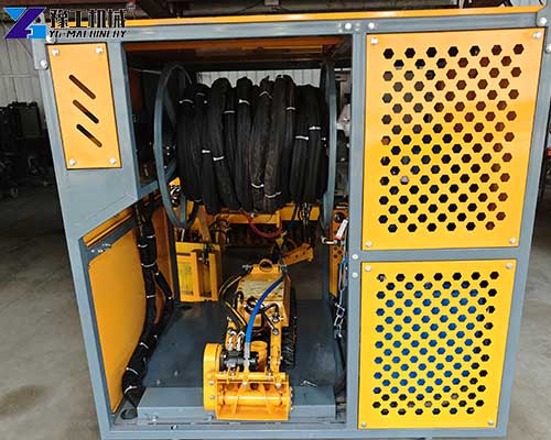 Crawler dredging robot operating inside a sedimentation tank for sludge cleaning