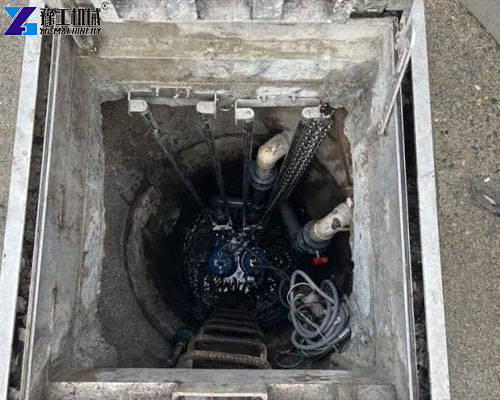 Remote-controlled robot cleaning sludge from a municipal pump station