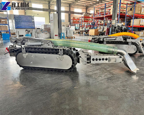 Operator remotely controlling a robot for pump station sludge cleaning