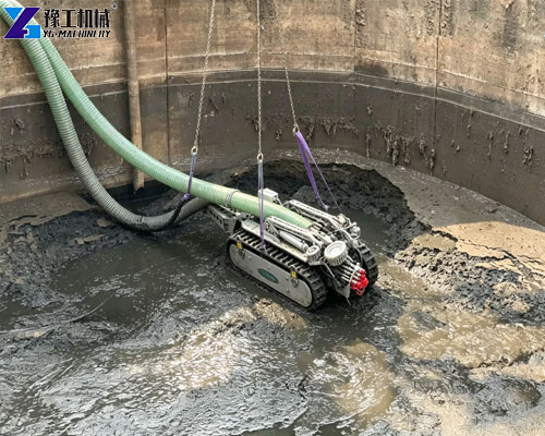 Sludge removal robot cleaning accumulated sediment from a sedimentation tank